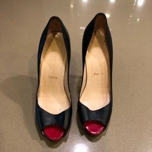 Preowned Christian Louboutin black pumps sz 6.5